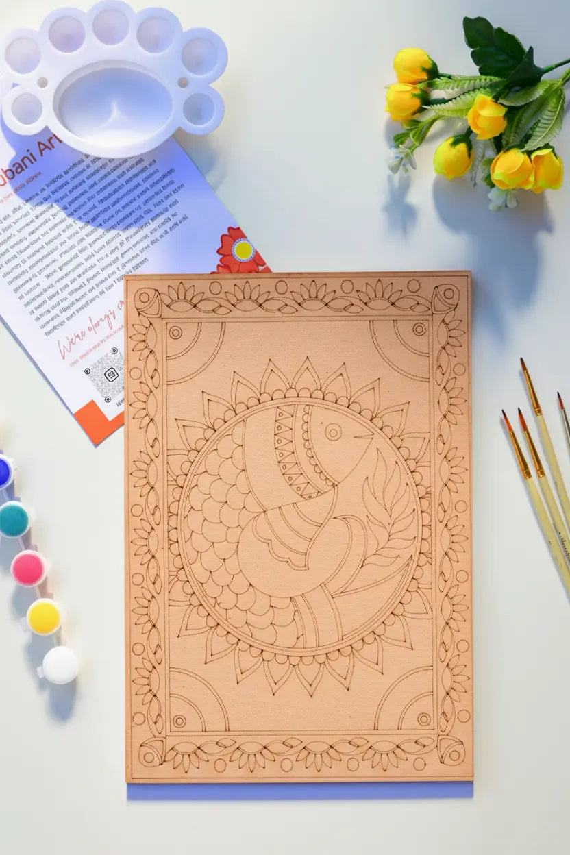Madhubani fish mandala art kit styled on a wooden table - A4 pre-drawn board, 12 acrylic paint colors, brushes and palette for Indian folk art DIY painting - Arttykase