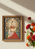 Finished Mughal princess Indian miniature painting framed on a wall with a flower bouquet beside it - Arttykase Indian folk art DIY kit wall décor result