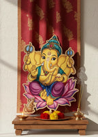 Finished Lord Ganesha painting on a pre-drawn wooden board with vibrant colors against a red curtain - Arttykase Indian folk art DIY kit