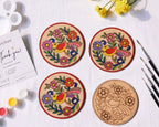 Four finished hand-painted Madhubani bird mandala coasters with colorful Indian folk art bird and floral designs displayed on a white surface